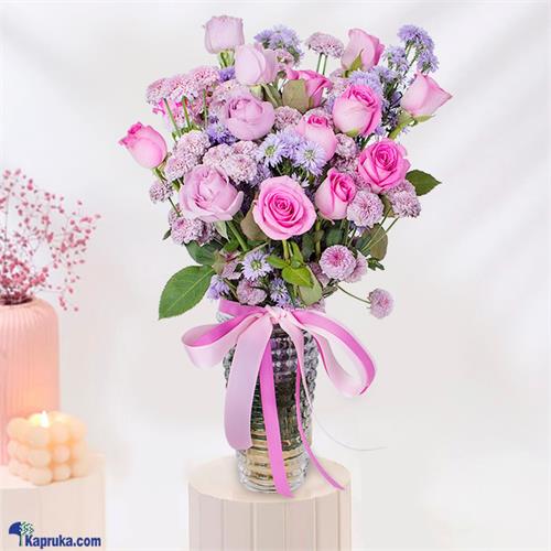 Ribboned Rose Garden Flower Arranged In Premium Glass Vase