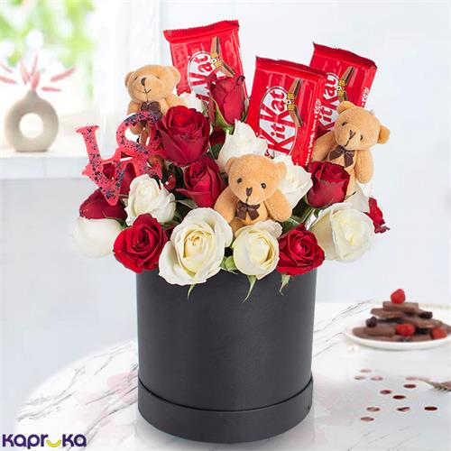 Romantic Love Nest Flower Arrangement With 18 Red Roses And Fifteen White Roses