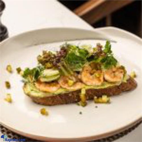 Grilled Marinated Prawns With Crushed Avocado On Sour Dough Toast