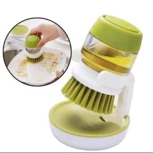 Soap dispensing palm brush with storage stand
