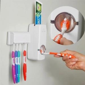 One-touch auto toothpaste dispenser + toothbrush holder