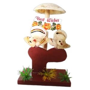 Wooden statue gift with seashells