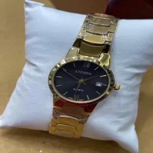 Gold Top Brand Luxury Women Quartz Wrist Watch (Date Working )